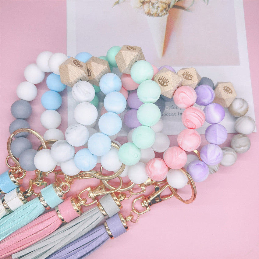 Llavero bohemio de la muñeca de la borla del cuero al por mayor del silicón